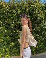 A part of an exclusive and limited drop, our Riviera crochet top is the perfect addition to your summer wardrobe. With it's soft material and relaxed fit, it will soon become your every day staple.  Heading to the beach or having cocktails on a hot summer day? Just throw it on your favourite Sundaze bikini top for a stunning outfit. 